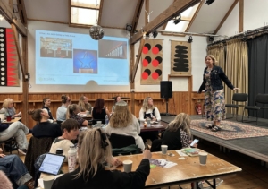 Sam Kirby speaking at Holistic Her 2025